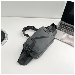 Detail of the dark gray waterproof nylon waist bag with high-quality zipper and strap