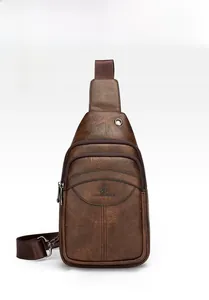 Front view of a dark brown vintage leather chest bag with three zipper pockets and strap
