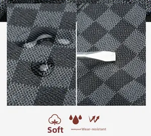 Waterproof and scratch-resistant black checkerboard bag fabric with water drops and tool test