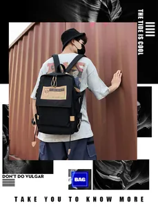 Detail view of large canvas travel backpack with cargo style pockets and drawstring