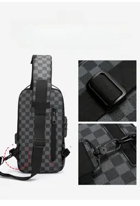 Detail view of adjustable strap buckle and D-ring on black checkered crossbody chest bag