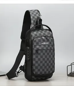Detail view of anti-theft combination lock on checkered crossbody chest bag for men
