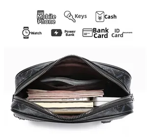 Detail view showing large storage capacity for phone and cash in a black PU clutch bag
