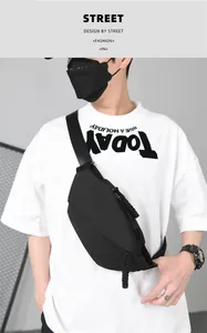 Detail of waterproof black crossbody chest bag with adjustable nylon strap for men