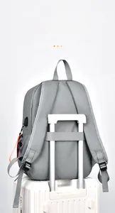 Sac à dos voyage avec sangle de bagage et port de charge USB externe pour ordinateur