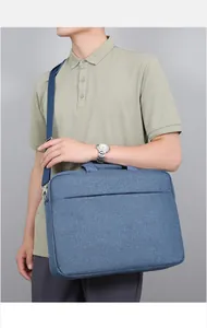 Sacoche ordinateur bleu marine avec bandoulière amovible et poche zippée horizontale