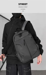 Close-up of waterproof nylon backpack showing vertical zipper and techwear details