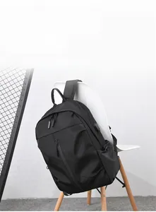 Detail of waterproof nylon backpack with external USB port and side charging interface