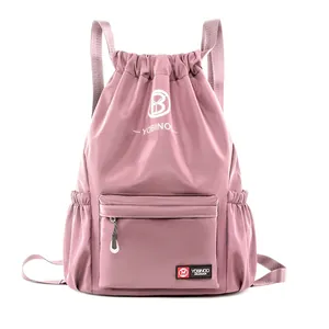 Pink drawstring backpack made of waterproof nylon for sports and fitness gym use