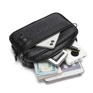 Men's black crossbody bag with logo pattern showing interior compartments and storage space