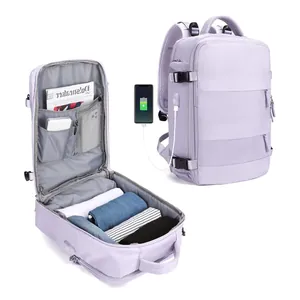 Detail of travel backpack with 180 degree opening and integrated USB charging port