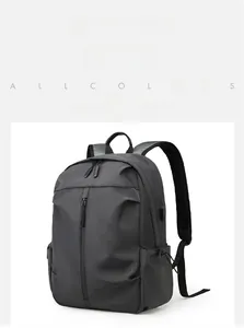 Detail view of water-resistant dark grey backpack with ergonomic padded straps