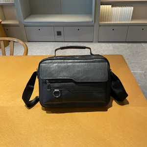 Mens black textured business briefcase with handle and adjustable shoulder strap
