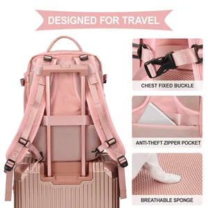 Pink travel backpack showing ergonomic mesh back padding and luggage strap attachment