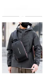 Detail of black motorcycle chest bag with anti-theft lock and fashion lettering