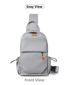 Detailed front view of grey oxford chest bag featuring orange pullers and drawstring pocket