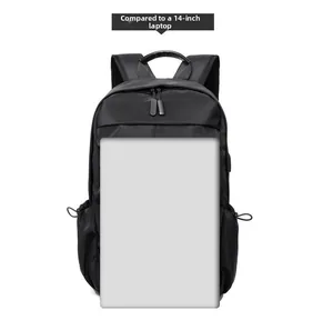 Detail showing the interior capacity of the black backpack compared to a 14-inch laptop