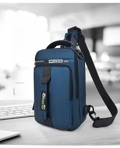 Detail view of the USB charging port and multi-layer zippers on a blue Oxford chest bag