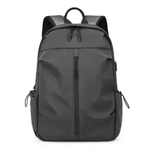 Water-repellent grey travel backpack with large capacity and ergonomic mesh straps