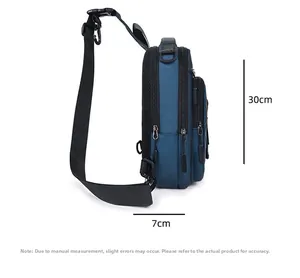 Side view of multi-layer blue oxford chest bag showing 30cm height and 7cm thickness