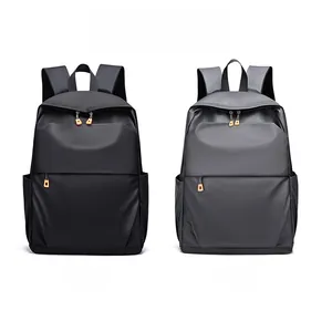Vue avant de sacs à dos noir et gris pour trajet avec tirettes de zip orange vif