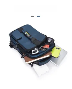 Deep blue multi-pocket oxford sling bag showing organized storage for gadgets and essentials