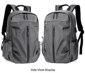 Side view of gray casual business backpack with USB port and waterproof matte fabric