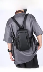 Close-up of waterproof black oxford fabric sling bag with functional multi-zipper pockets