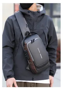 Detail of multi-functional chest bag showing security combination lock and USB charging port