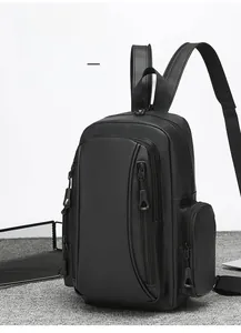 Close-up of black waterproof multi-pocket backpack with multiple zipper compartments