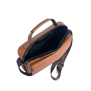 Overhead view of brown business messenger bag showing spacious interior and zipper pocket