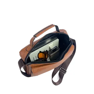 Top view of brown leather bag showing large capacity for books and personal items