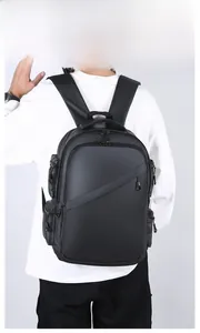 Model showing the ergonomic padded straps and multi-pocket design of the black laptop backpack