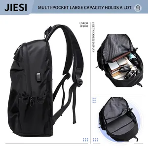 Large capacity black tactical backpack with USB port and striped lining interior view