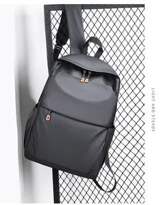 Détail du sac à dos business gris foncé imperméable avec tirettes de fermeture orange