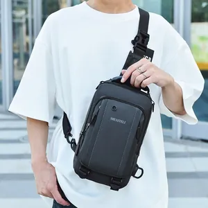 Men's black tactical oxford chest bag with multi-layer zippers and adjustable buckle straps