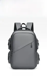 Front view of grey business laptop backpack with matte waterproof fabric and sleek zippers