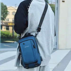 Waterproof navy blue oxford crossbody chest bag for men with integrated USB charging port