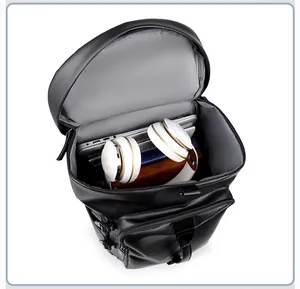 Interior view of waterproof travel backpack showing laptop and headphone storage compartments
