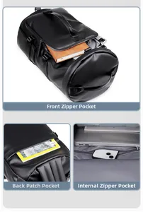 Detail view of large storage pockets and front zipper compartment of a black travel bag