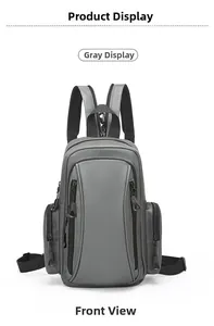 Front view of grey waterproof backpack showing multiple zip pockets and webbed handles