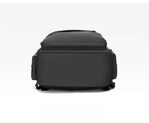 Detailed bottom view of black waterproof business backpack with reinforced stitching and side pockets