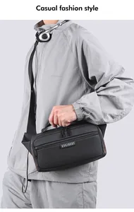 Adjustable wide fabric strap and double zipper detail on a black waterproof waist bag