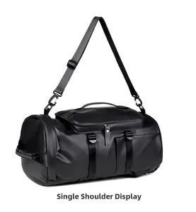 Detail of multi-functional black PU travel bag showing single shoulder strap and metal hardware