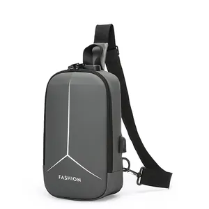 Gray hard shell crossbody chest bag with anti-theft lock and external USB charging port