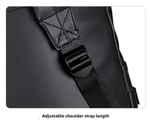 Detail of adjustable shoulder strap with reinforced stitching on black PU travel backpack