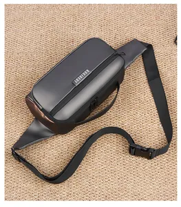 Close-up of waterproof synthetic crossbody bag with brand logo and adjustable strap