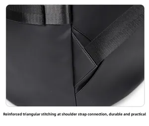 Close-up of triangular reinforced stitching on shoulder straps for travel backpack durability