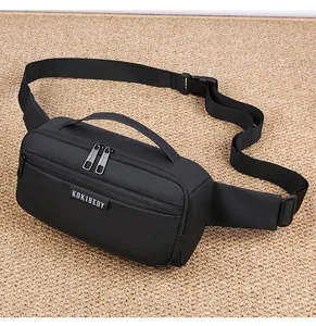 Detailed view of black nylon crossbody chest bag with adjustable strap and dual zippers