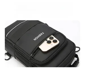 Detailed close-up of a multi-compartment front storage bag with a smartphone inside